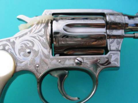 Right side view of the .32 New Police Detective Special with full coverage engraving